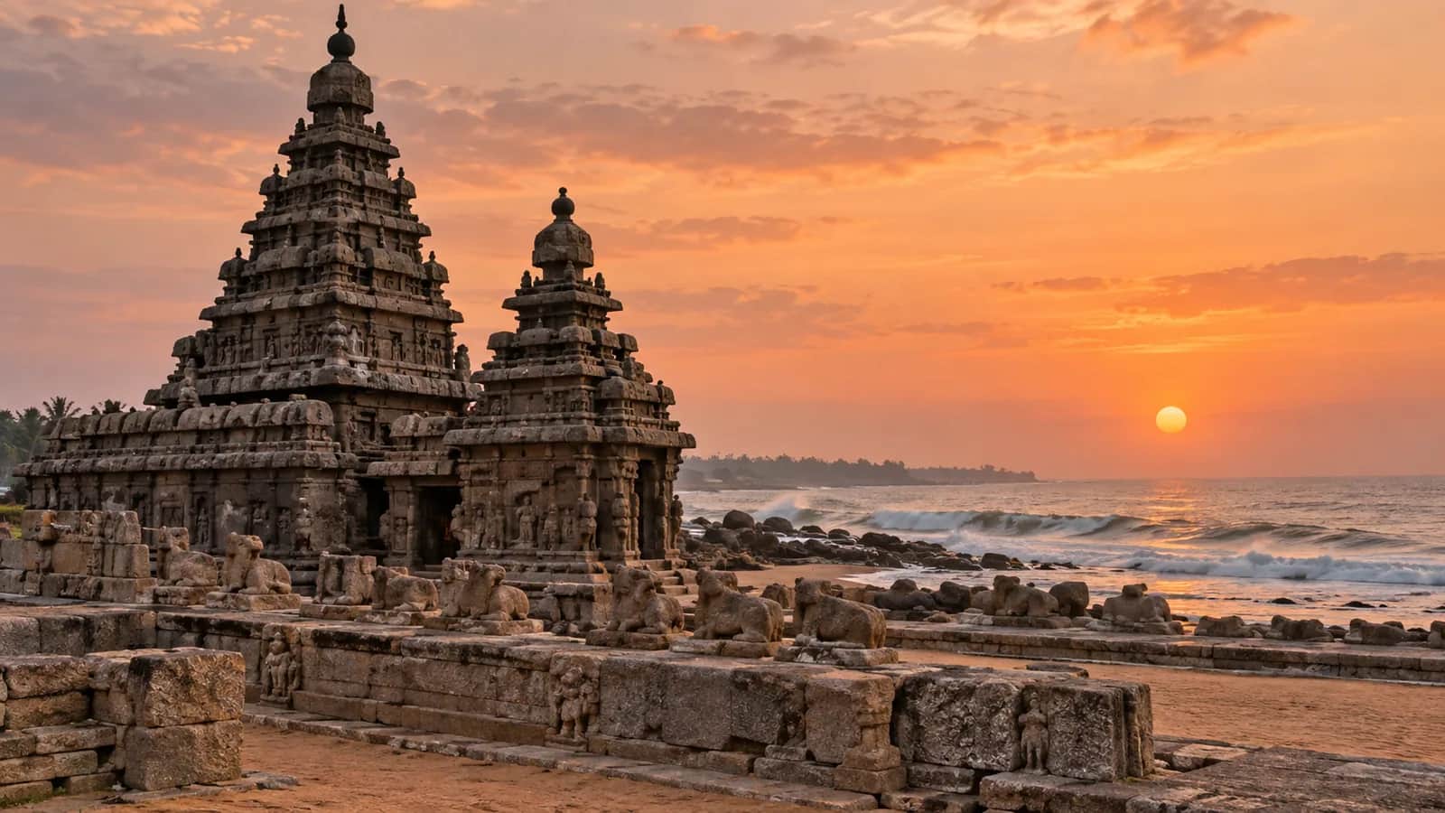 The ancient granite Shore Temple at Mahabalipuram beside the Bay of Bengal at dawn