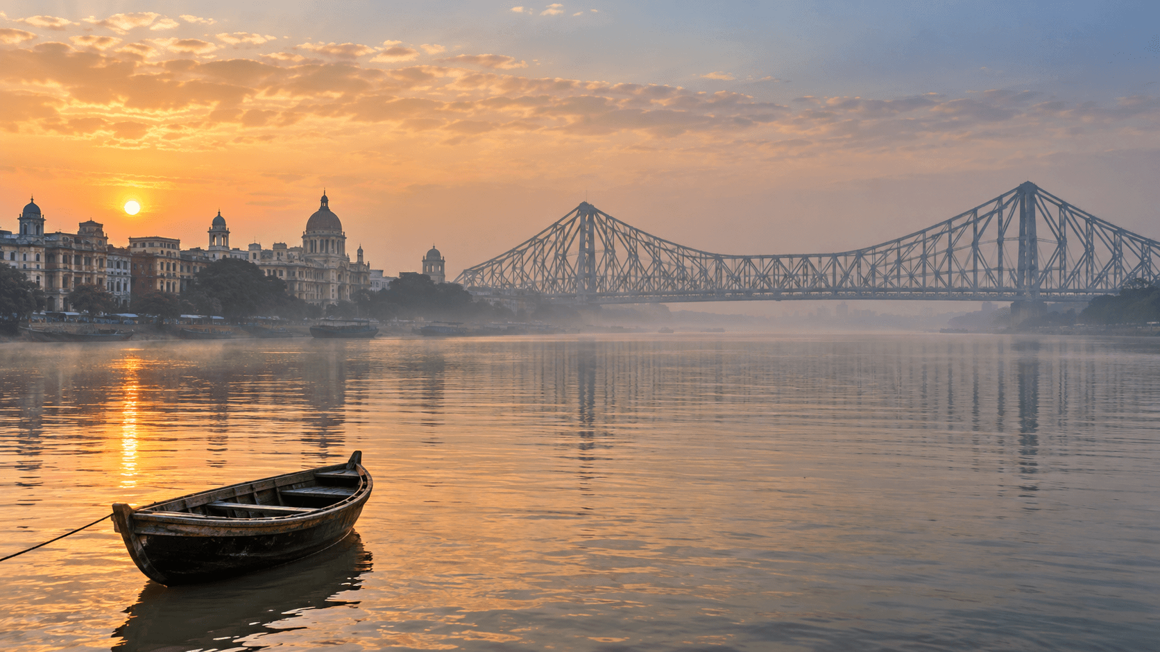 Sunrise over Kolkata’s Hooghly River and Howrah Bridge