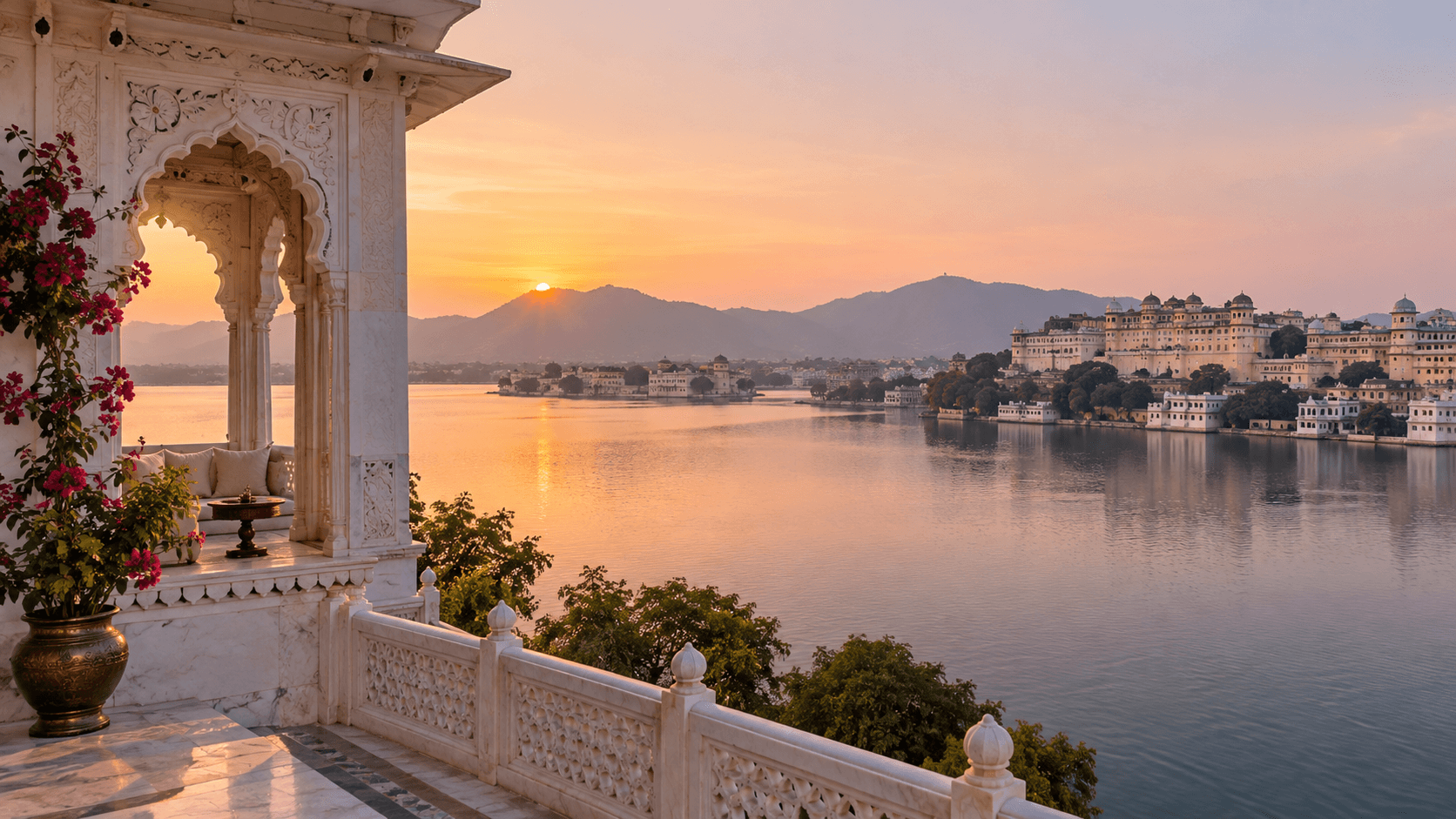 A white heritage haveli terrace overlooking Lake Pichola in Udaipur at sunrise