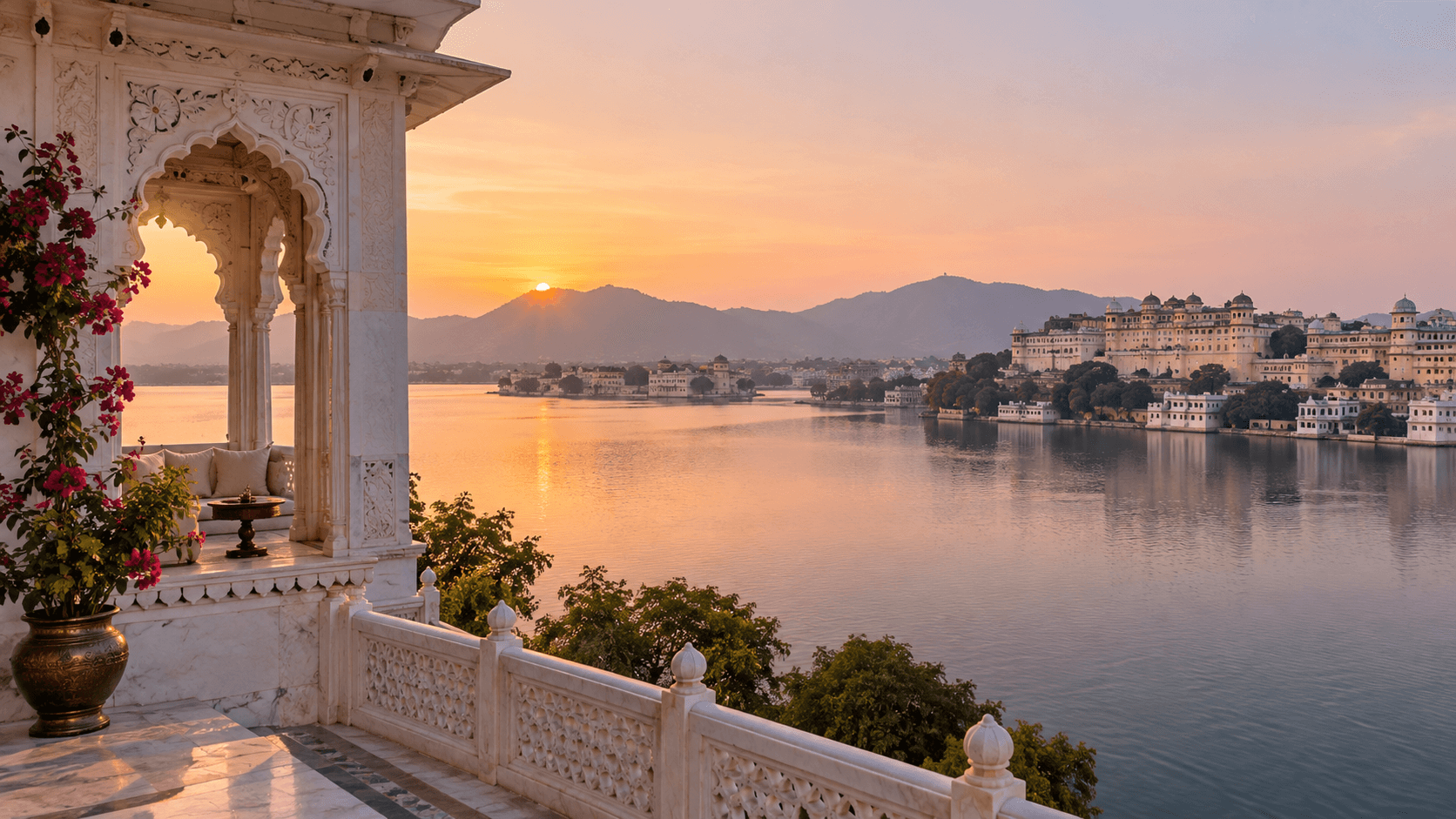 A white heritage haveli terrace overlooking Lake Pichola in Udaipur at sunrise